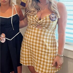 Yellow spaghetti strap gingham dress